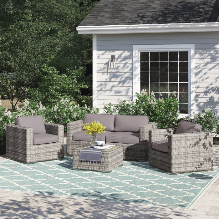 Joss and Main Conner 5 Piece Rattan Sectional Seating Group with Cushions