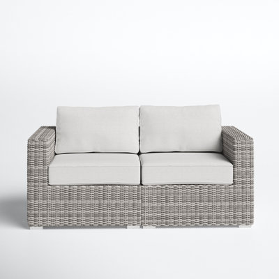 Conner 66" Wide Outdoor Wicker Loveseat with Cushions by Joss and Main