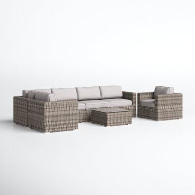 Conner 7 Piece Rattan Sectional Seating Group with Cushions by Joss and Main