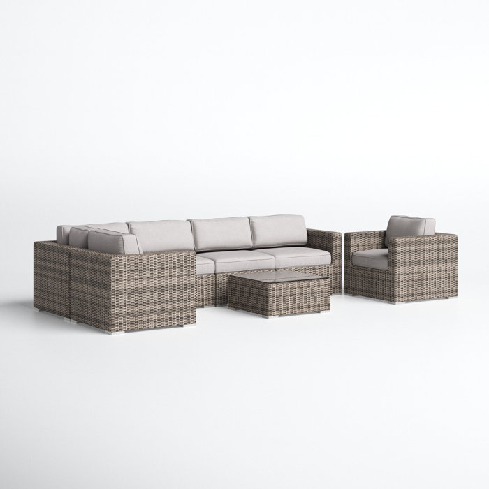Joss and Main Conner 7 Piece Rattan Sectional Seating Group with Cushions