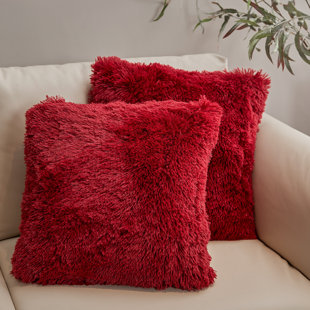 red fuzzy pillows
