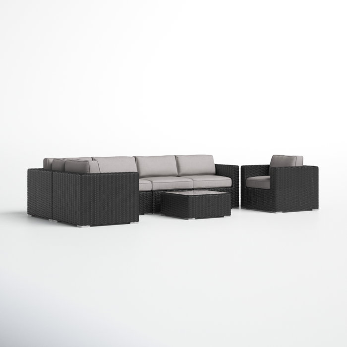 Joss and Main Conner 7 Piece Rattan Sectional Seating Group with Cushions