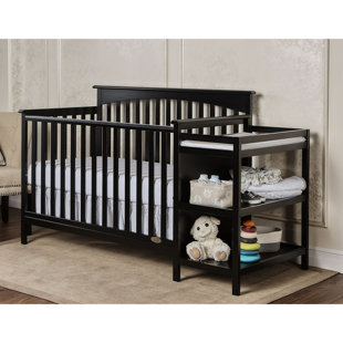 changing table next to crib