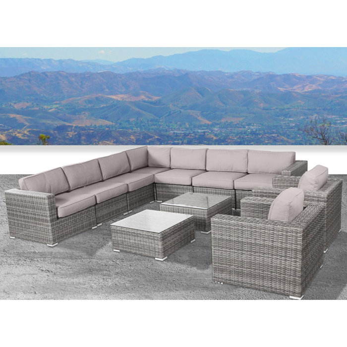 Joss and Main Conner 11 Piece Rattan Sectional Seating Group with Cushions