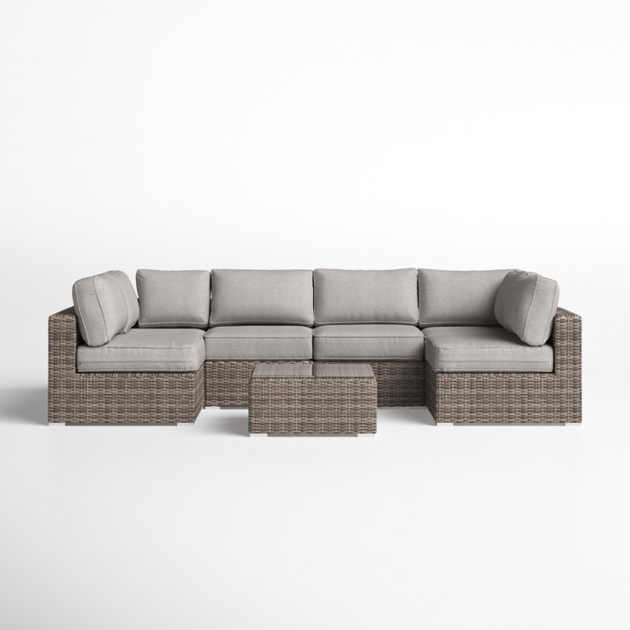 Joss and Main Conner 7 Piece Rattan Sectional Seating Group with Cushions