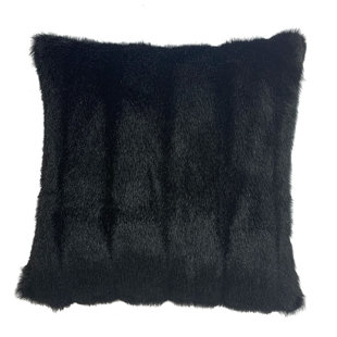 black fuzzy pillow