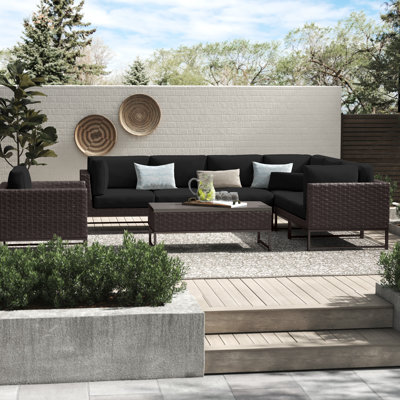 8 Piece Rattan Sectional Seating Group with Cushions by Joss and Main