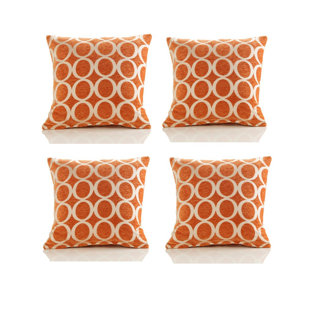 orange cushions and throws
