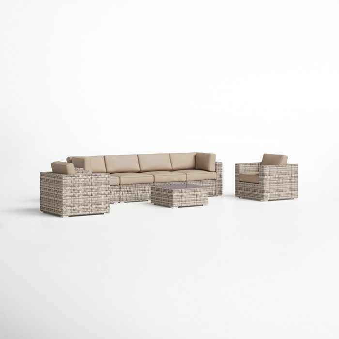 Joss and Main Conner 7 Piece Rattan Sectional Seating Group with Cushions