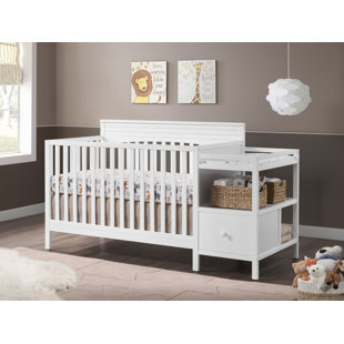 crib with changing table attached